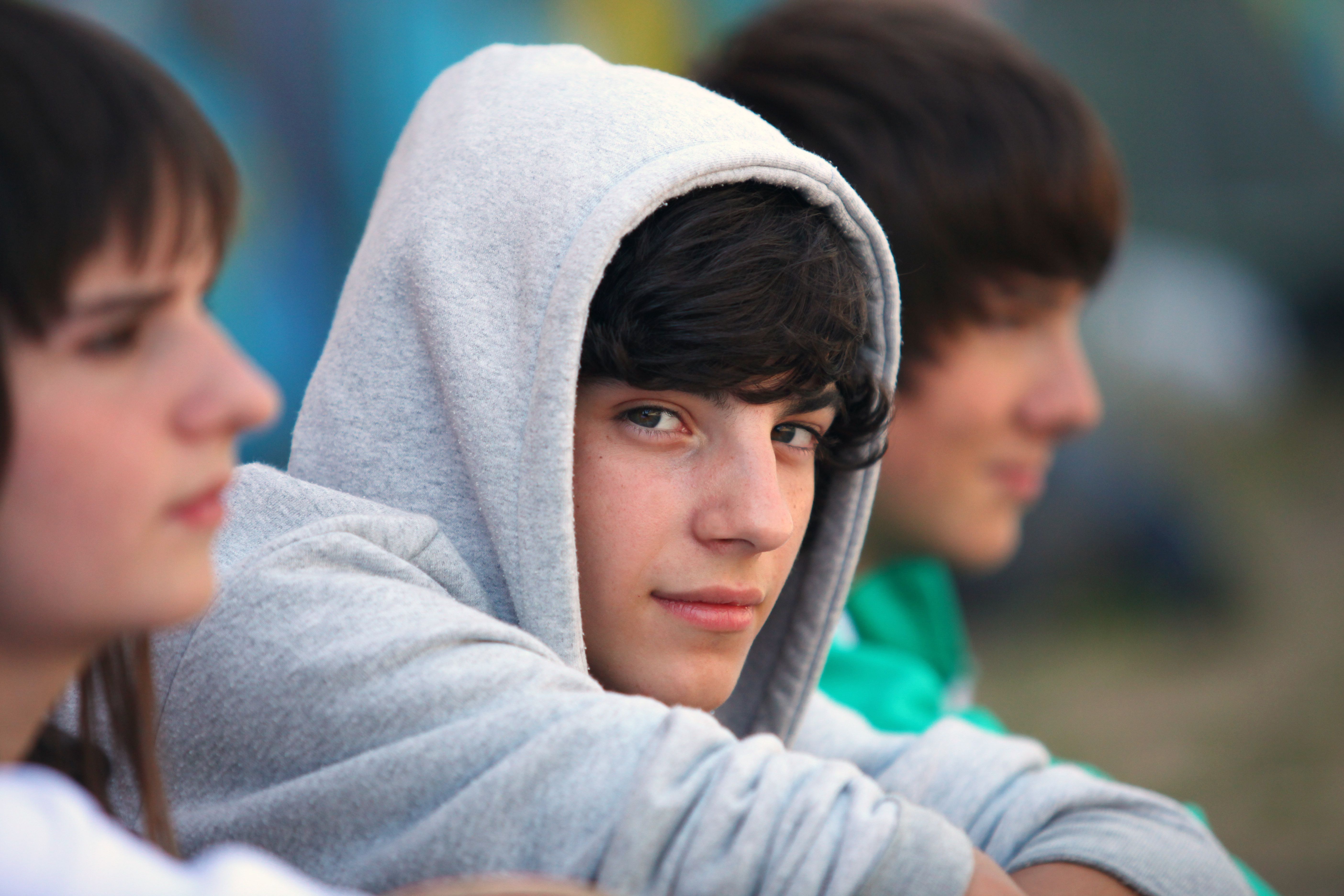 Three,Teenagers,Sat,Together